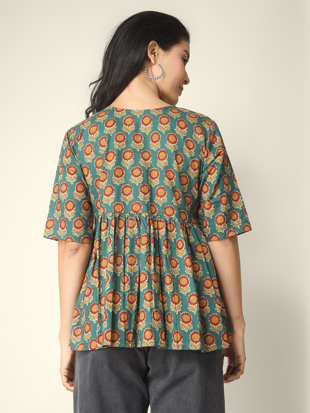 Green Printed Half-Sleeve Alia-Cut Cotton Peplum Top